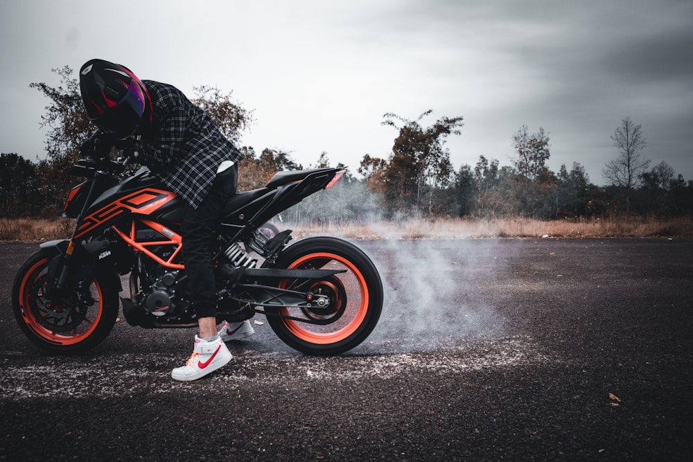 a person riding a motorcycle on a road