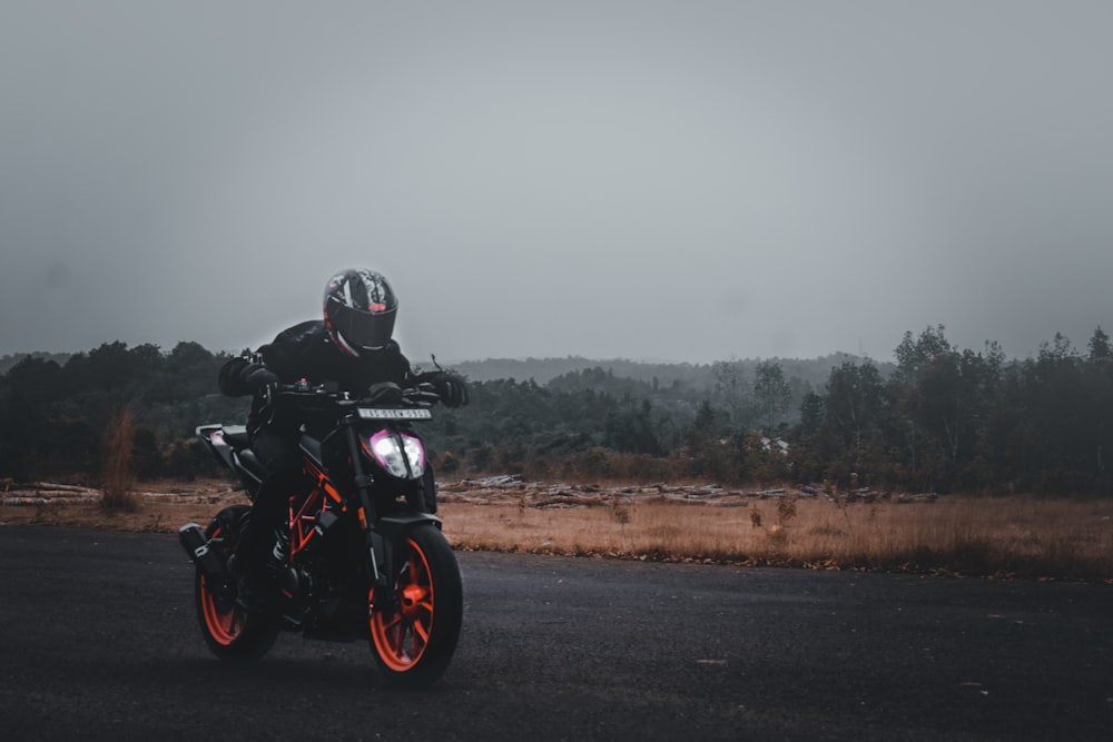 a person riding a motorcycle on a road