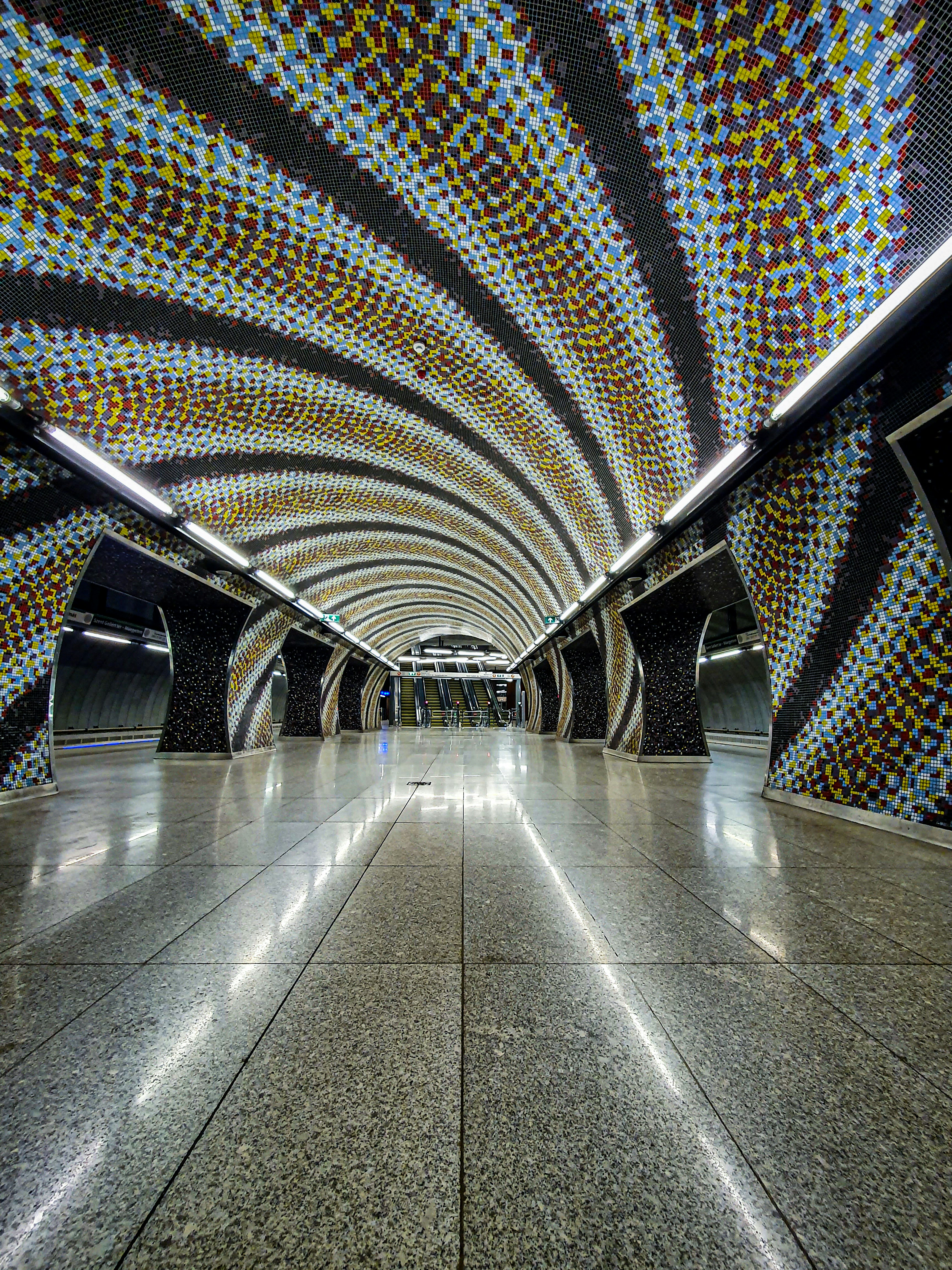 A subway station with a very colorful ceiling photo – Free Corridor ...