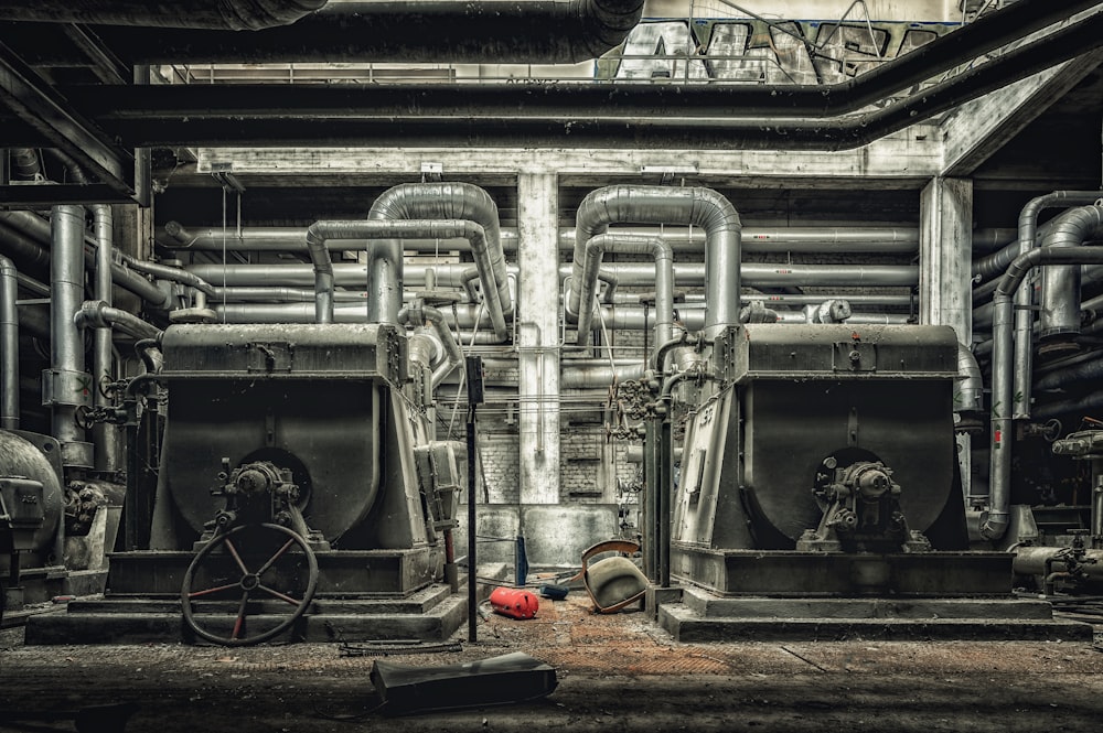 a large industrial building with pipes and valves