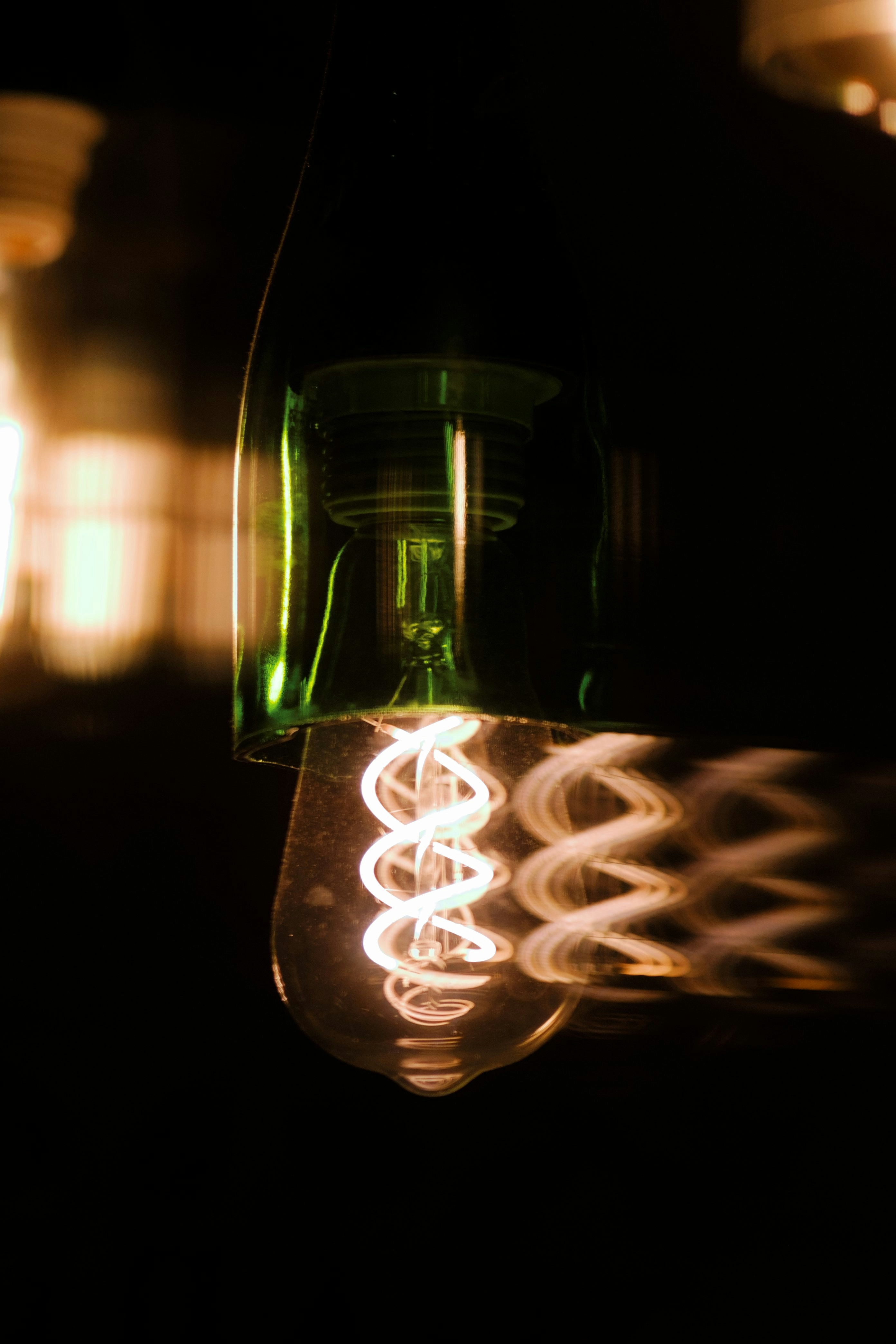 a close up of a light bulb in the dark