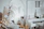 An intimate photo of a calm therapy space with organic decor and soft terracotta accents.