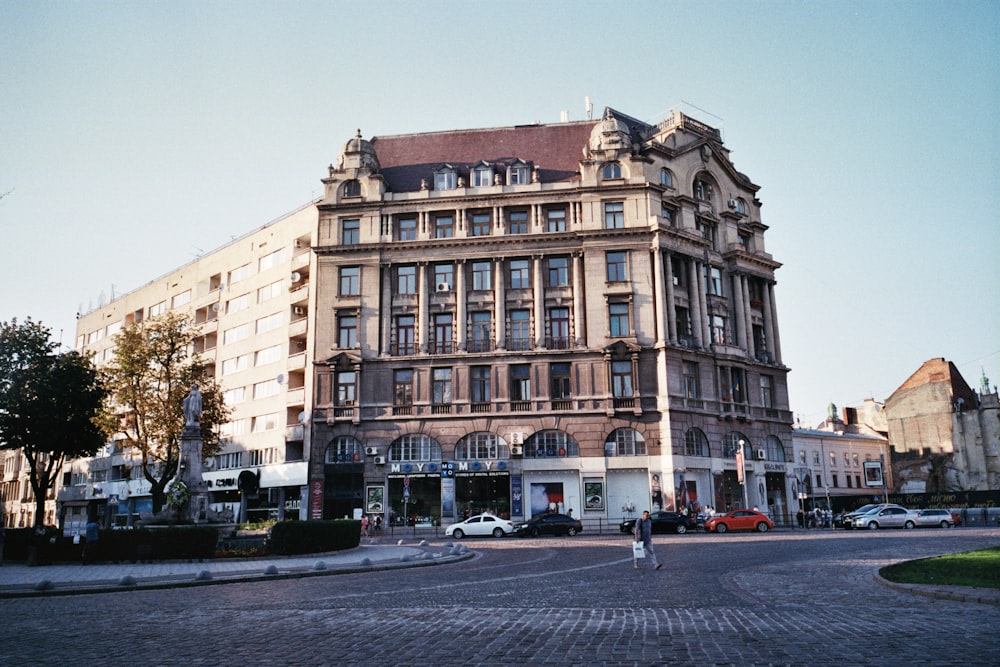 a large building sitting on the corner of a street