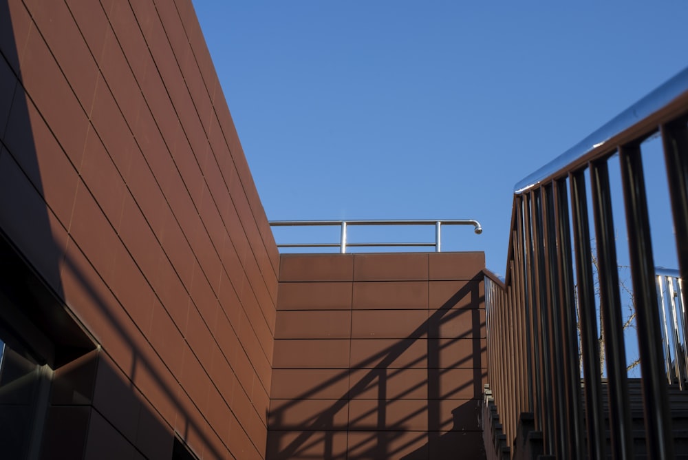 a building with a metal railing next to it