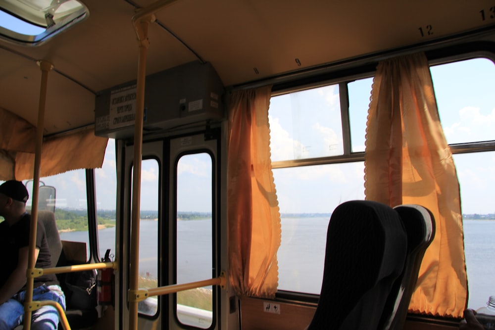 a person sitting next to a window