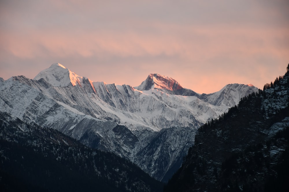 a view of a mountain range at sunset