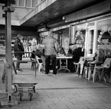 A group of locals gathered around a table, smiling and chatting over hearty Irish breakfasts.