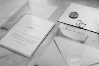 a couple of wedding rings sitting on top of a table