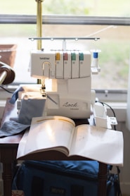 a sewing machine sitting on top of a table