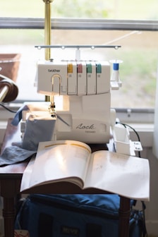 a sewing machine sitting on top of a table