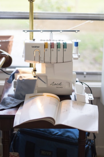 a sewing machine sitting on top of a table