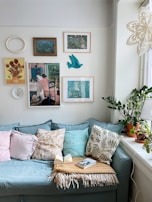 A cozy corner featuring blue cushions and decorative items from the catalog.