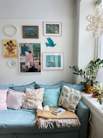 Cozy living room corner decorated with vivaaura's colorful home decor items.