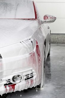 a car is covered in snow and ice