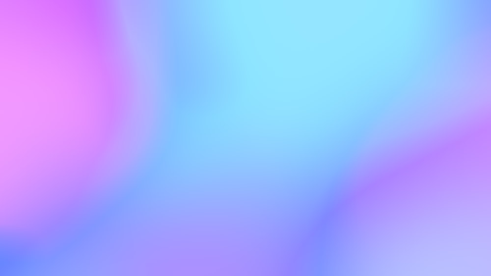 a blurry image of a blue and pink background