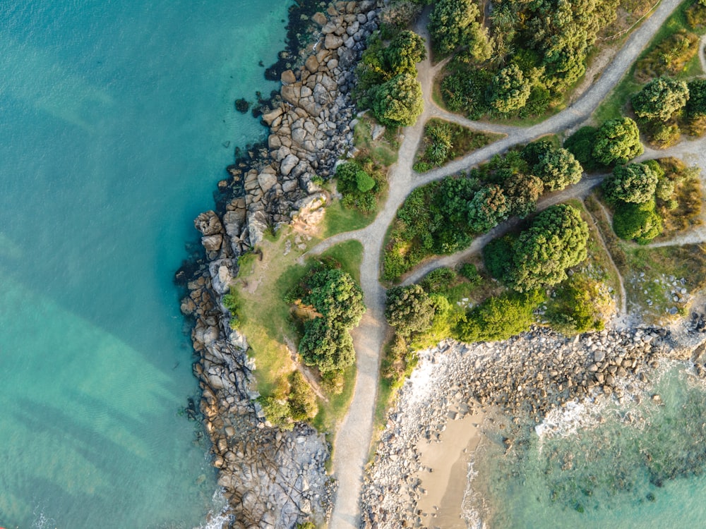 an aerial view of a beach and a body of water