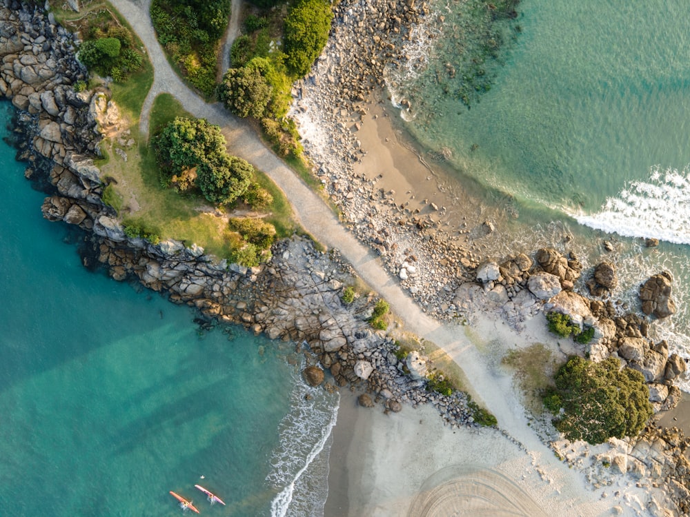 an aerial view of a beach and a body of water