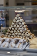 a display case filled with lots of pastries