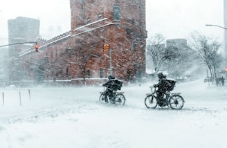 a couple of bikes that are in the snow