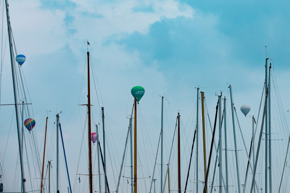 a lot of sailboats that are sitting in the water