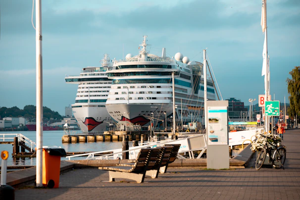 a large cruise ship docked at a pier