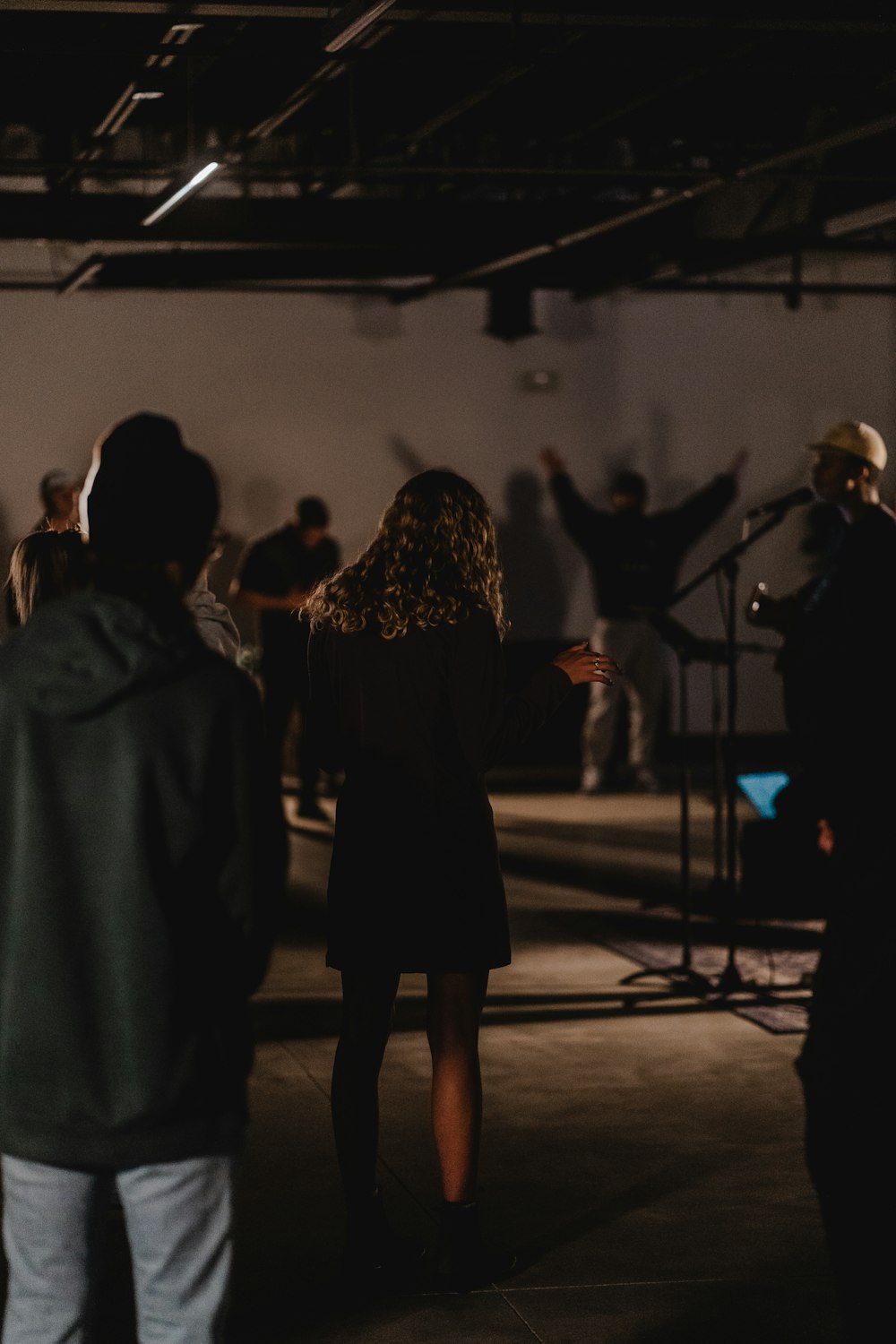 a group of people standing in a room