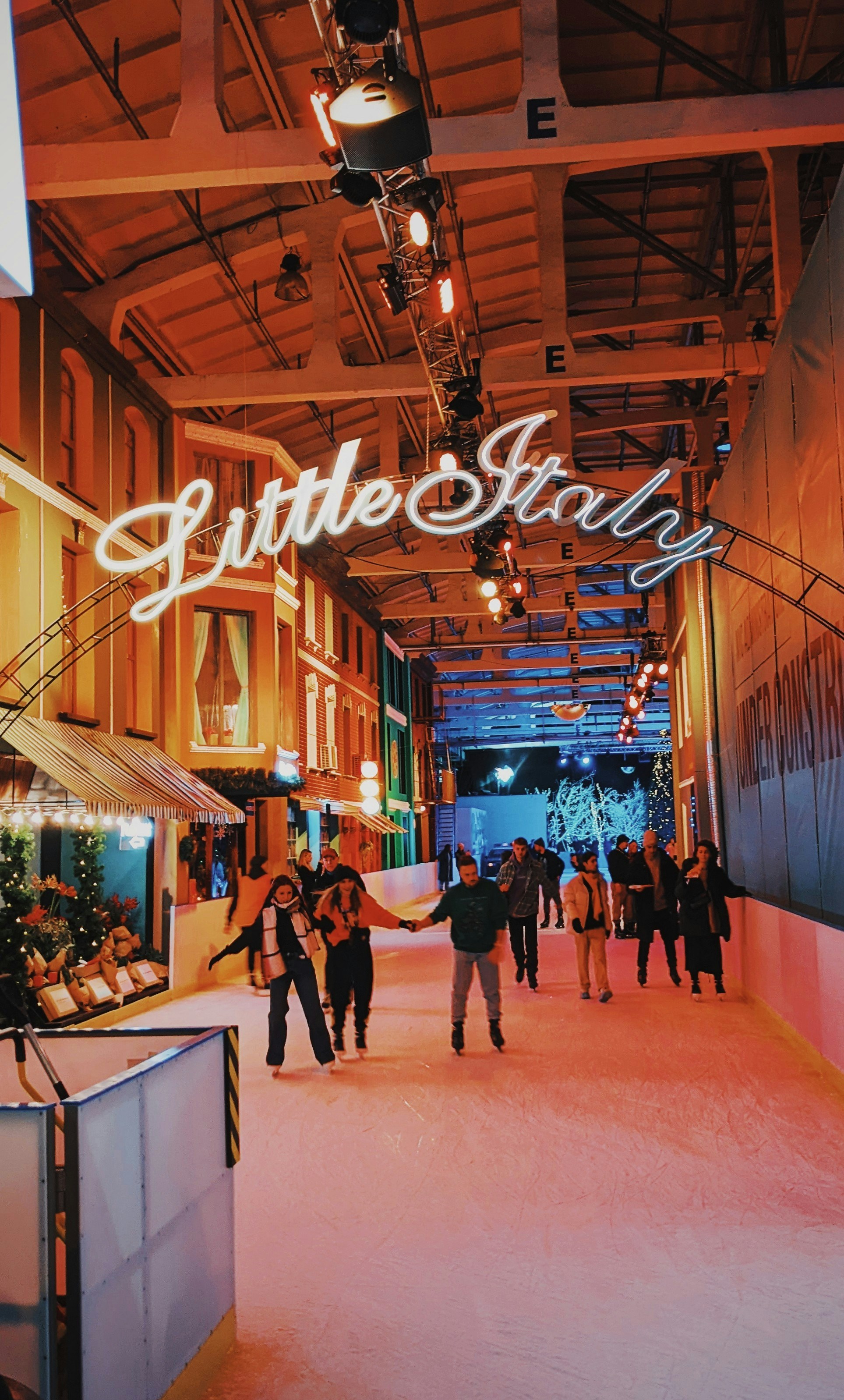a group of people walking down a hallway