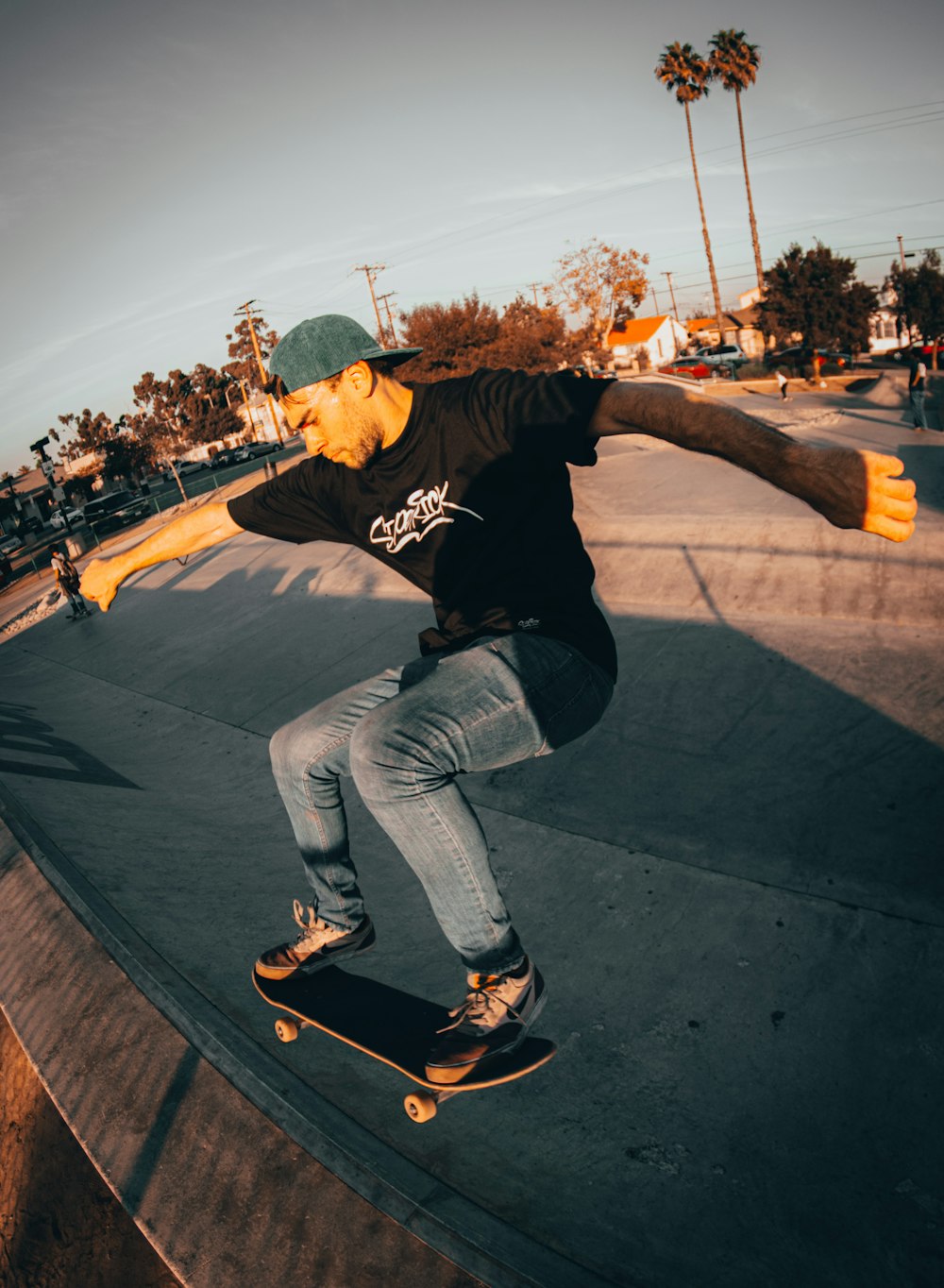 a man riding a skateboard down the side of a ramp