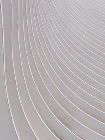 White space with a subtle line connecting three points symbolizing smooth logistics.