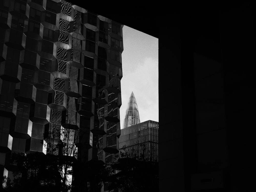 a black and white photo of a skyscraper