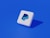 a white square with a blue p on it