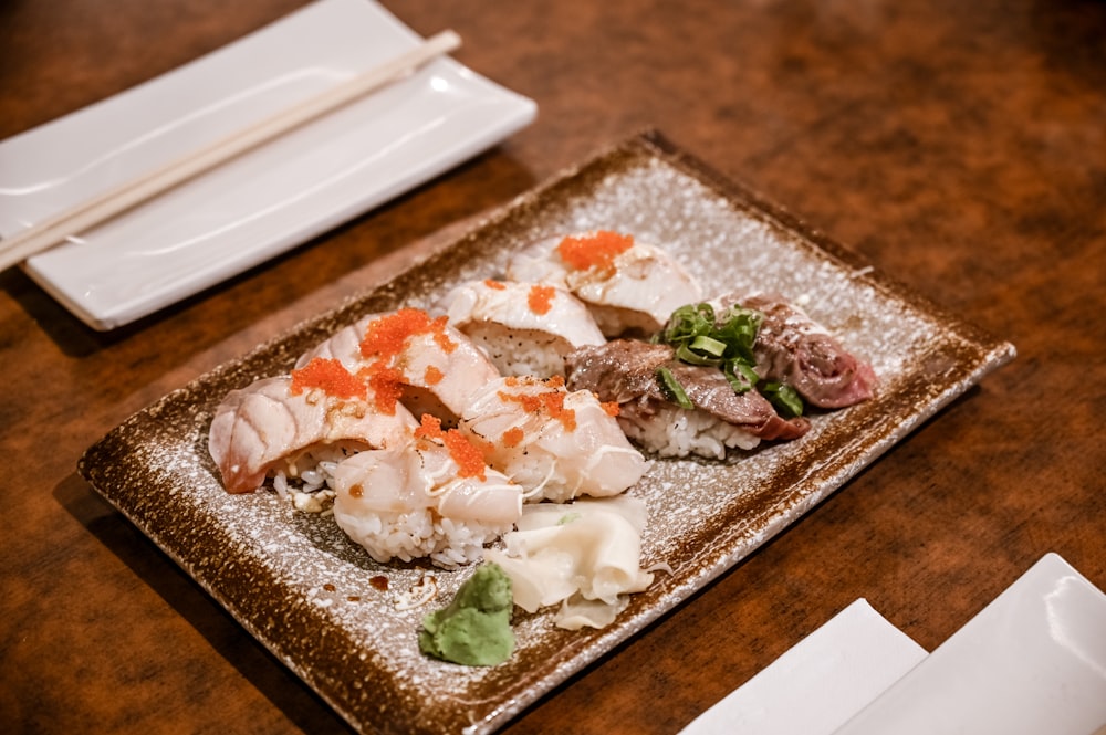 a plate of food on a wooden table