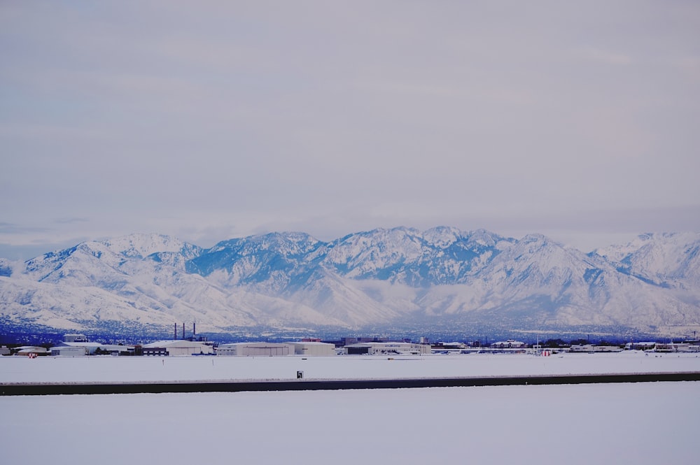 a view of a snowy mountain range in the distance