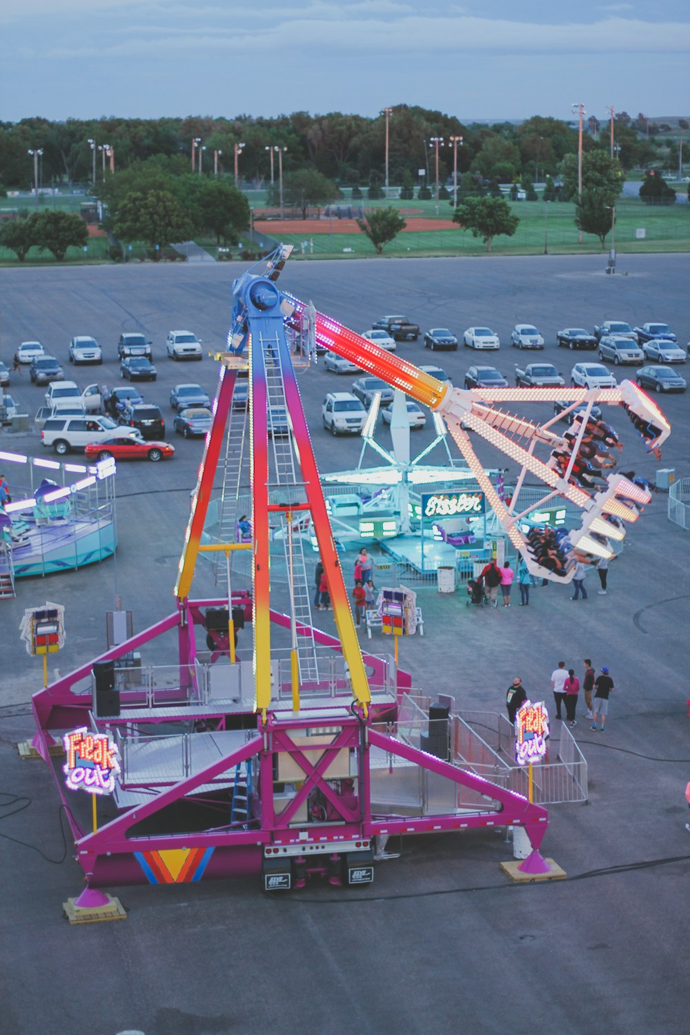 a carnival ride in a parking lot