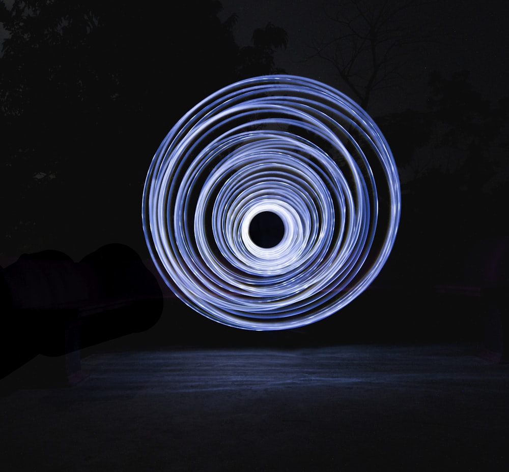 a circular light painting in the dark