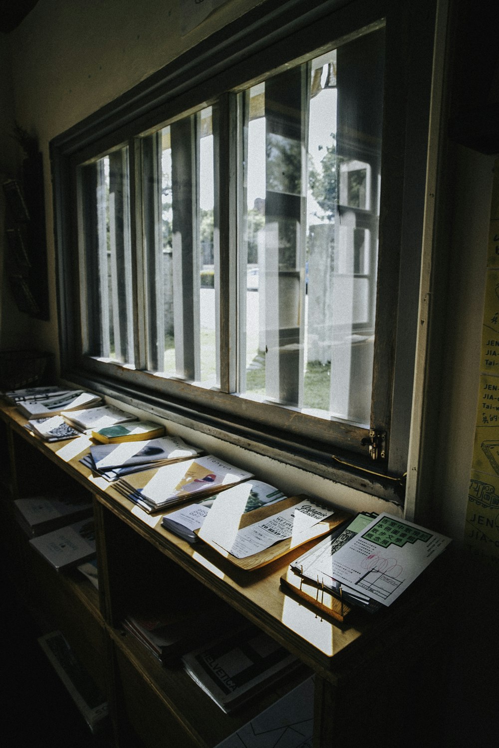 a desk with a lot of papers on top of it