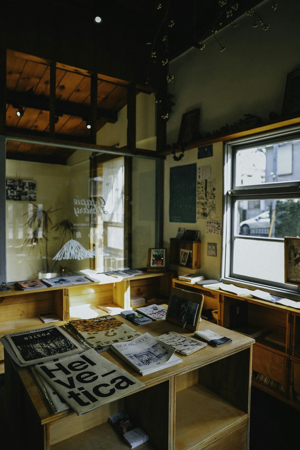 a room with a desk and a window