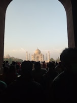 A scenic view of the Taj Mahal at dawn, captured during one of our group tours.