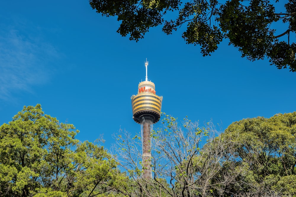 a very tall tower with a sky background