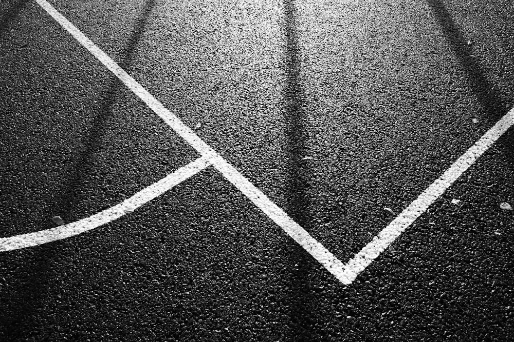 a black and white photo of a street