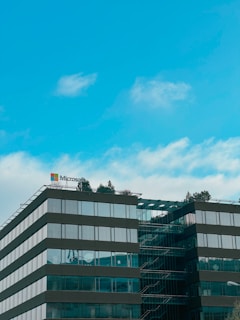 a tall building with a flag on top of it