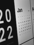 A calendar marked with important dates, highlighting cancellation deadlines.