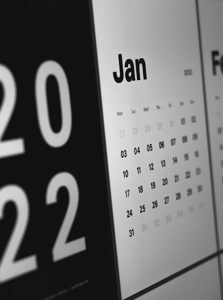 A calendar marked with important payroll deadlines and tax submission dates.