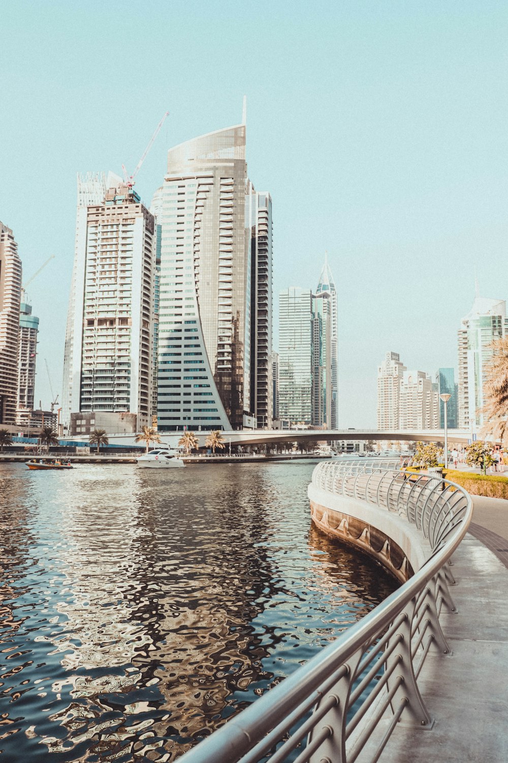 a view of a body of water with buildings in the background