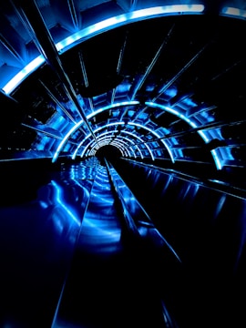 a tunnel with blue lights in the middle of it