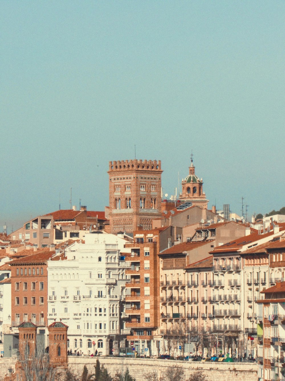 a view of a city with a clock tower