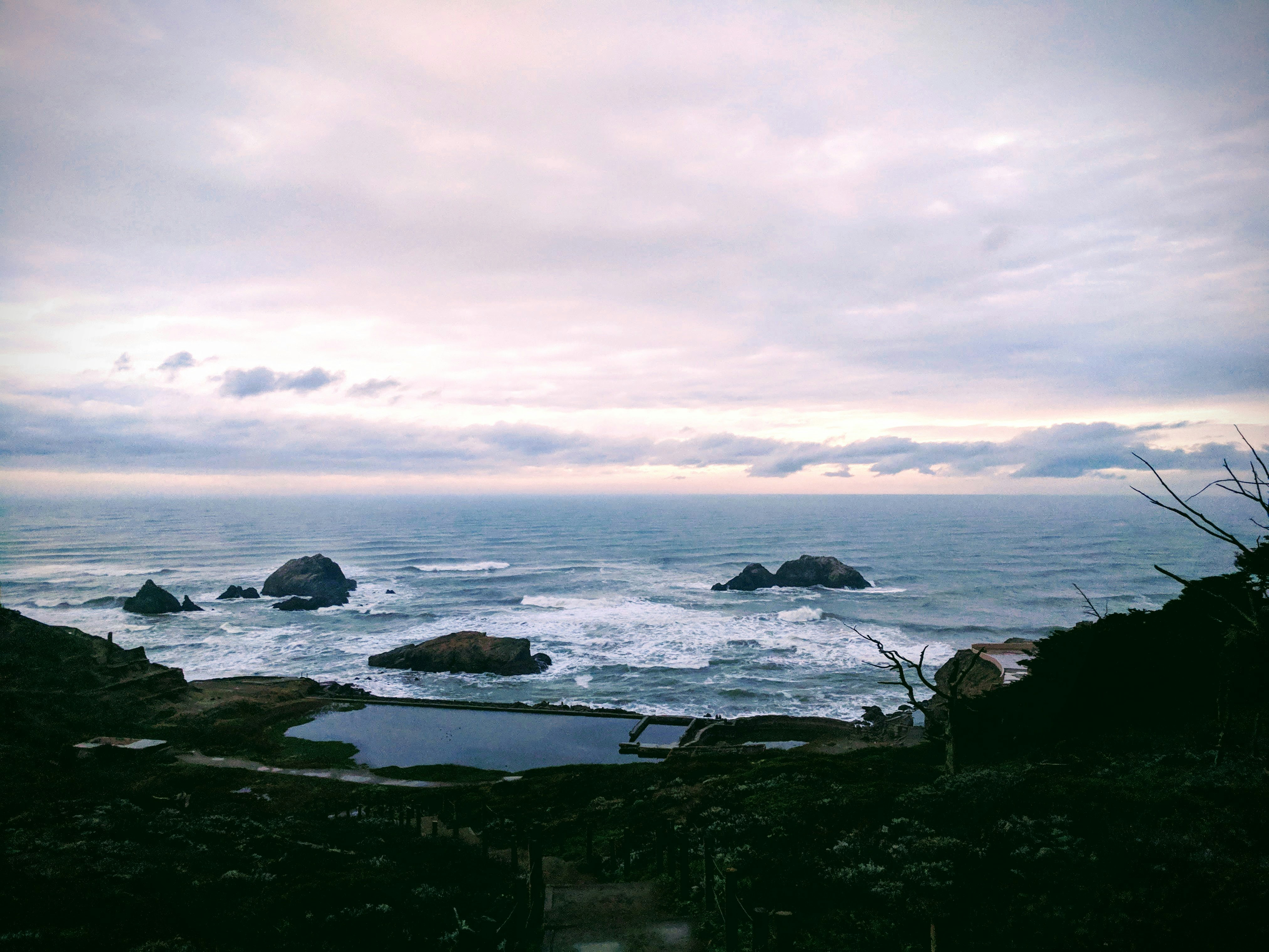 a view of a body of water from a hill