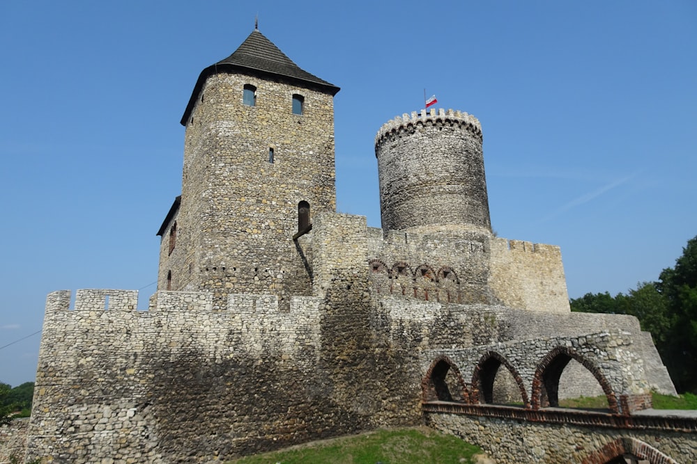 a castle with two towers on top of it