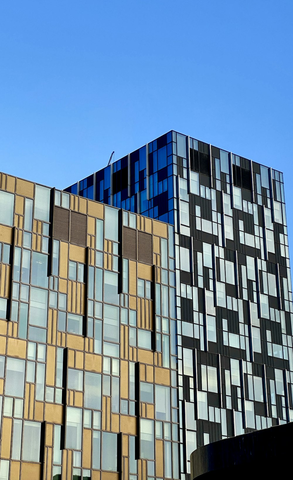 a tall building with lots of windows on top of it