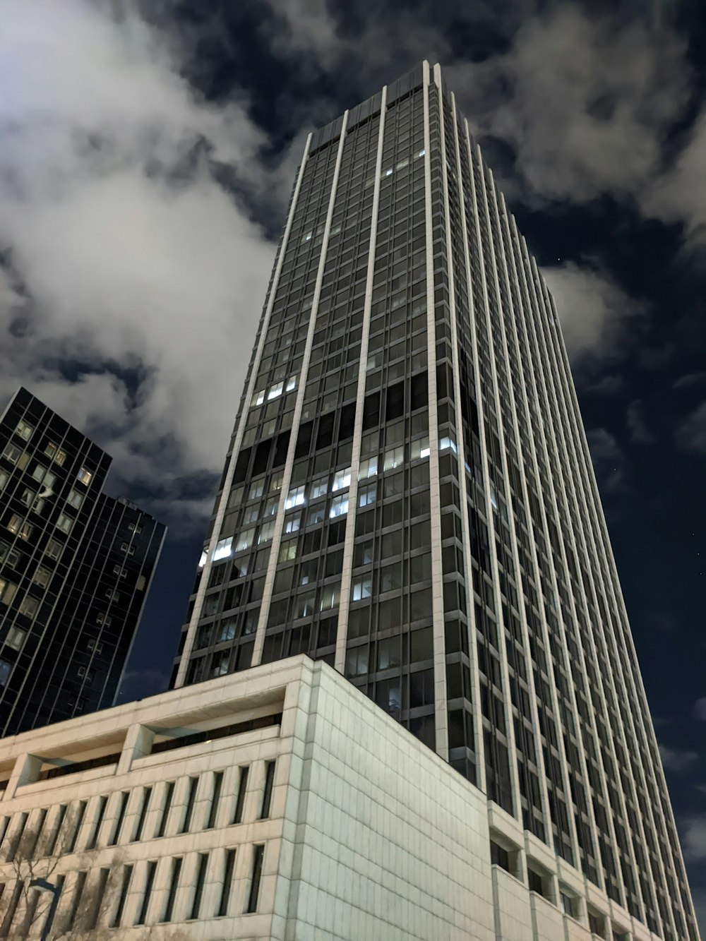 a very tall building with a sky background